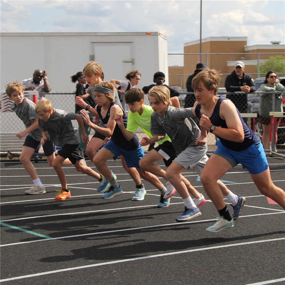  Boys racing on track